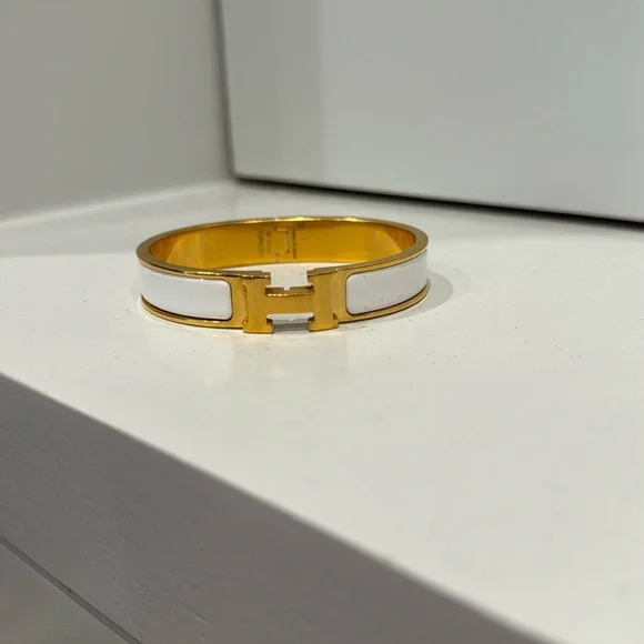 Authentic Hermès Clic H narrow bracelet in white enamel with gold hardware - Picture 1 of 2